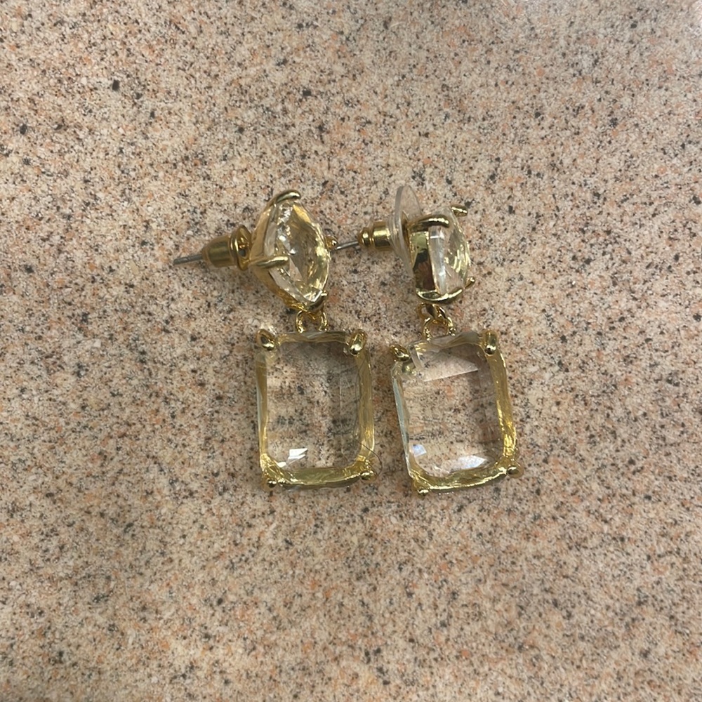 Clear dangle earrings with gold trim